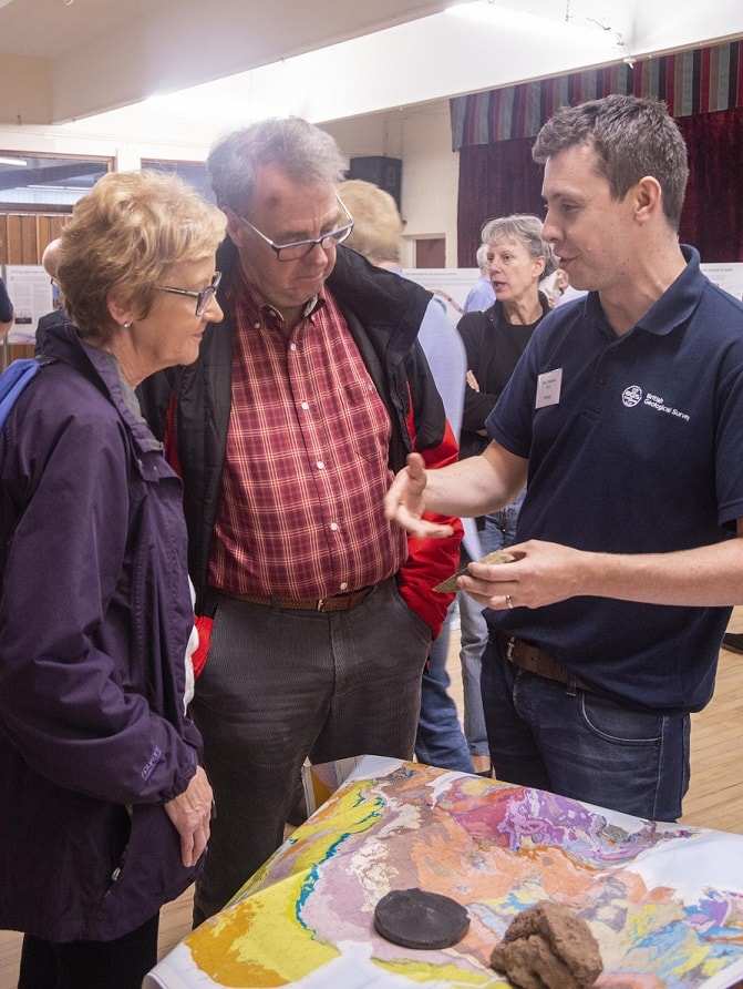BGS regional geoscientist Dr Oliver Wakefield discusses local geology with residents during a community engagement event